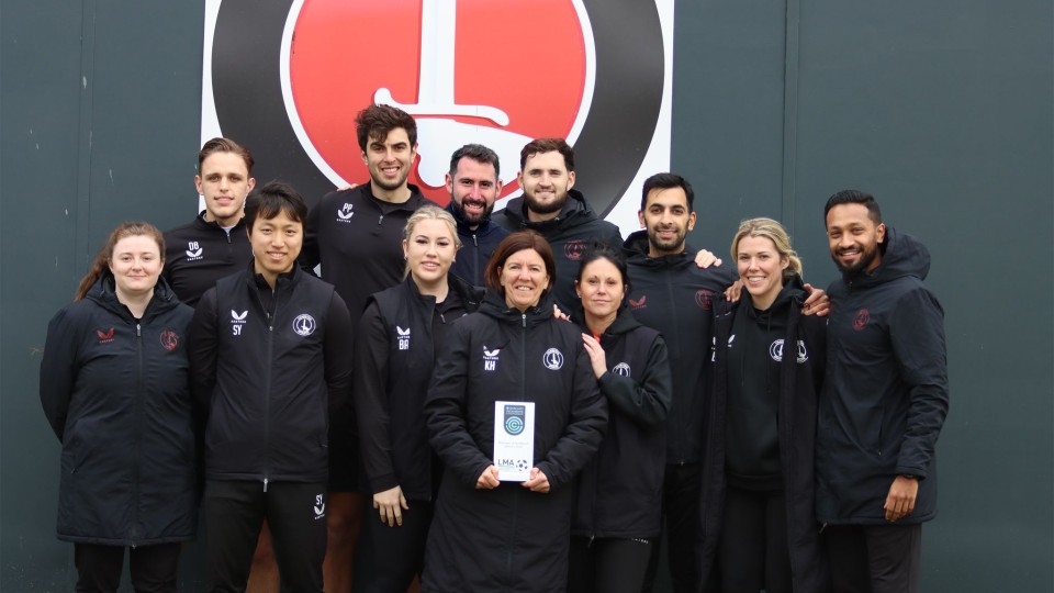 Karen Hills and her coaching staff
