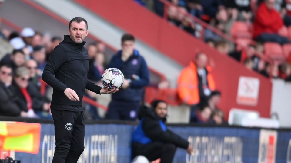 Nathan Jones watches on