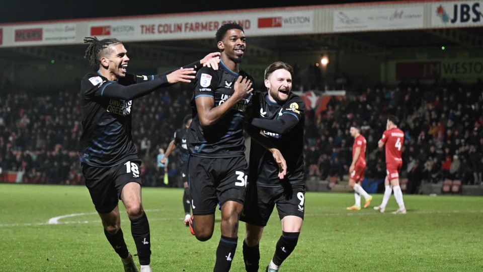 Bakinson celebrates with May and Watson