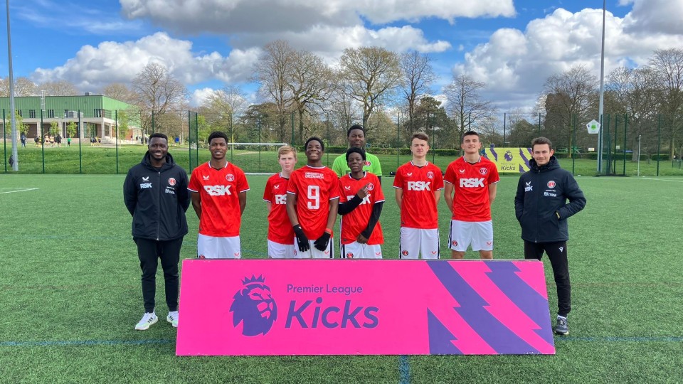 Premier League Kicks participants and staff with branding
