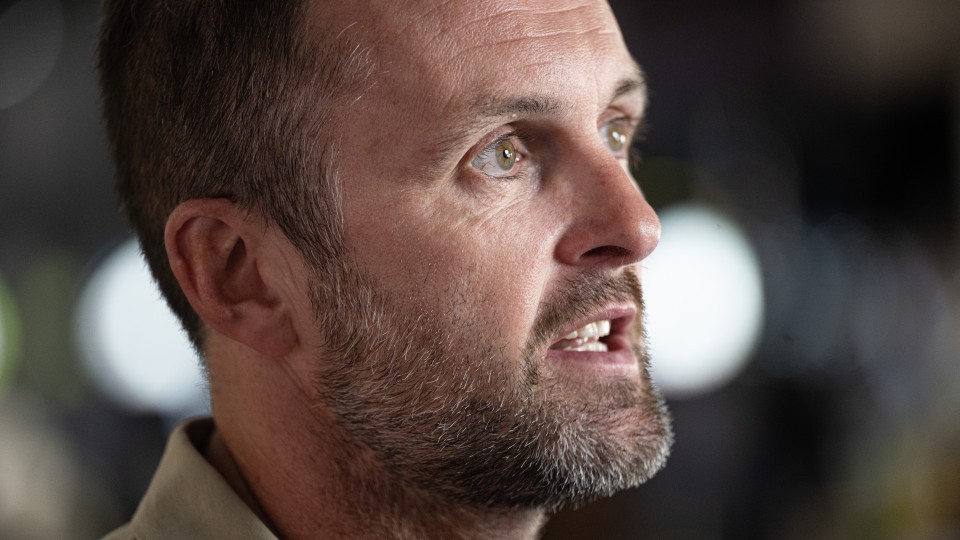 Nathan Jones looks on