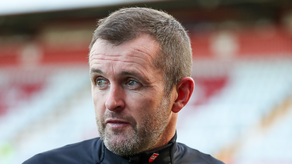 Nathan Jones looks on