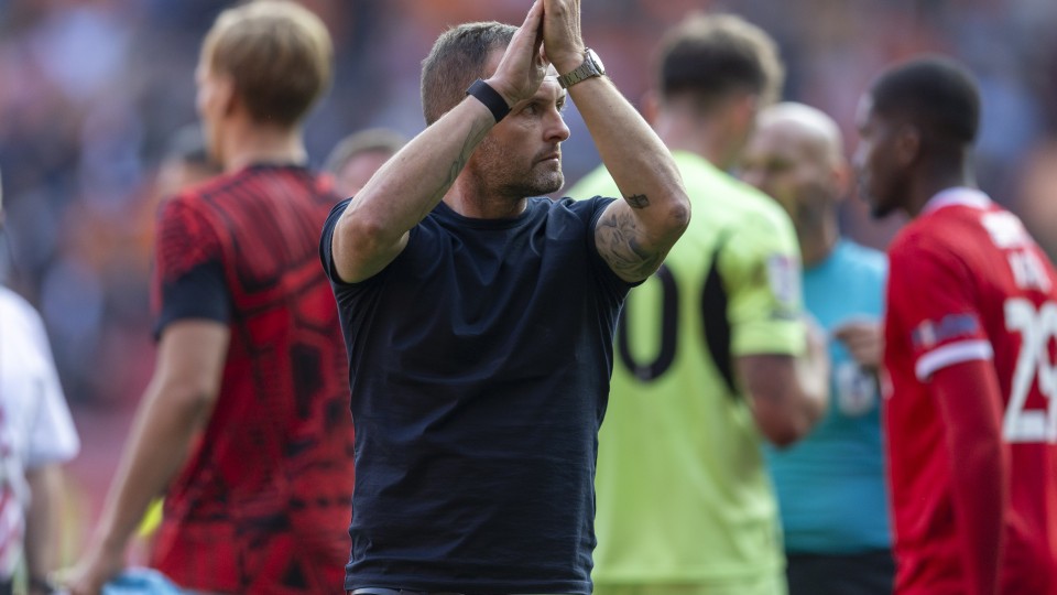 Nathan Jones claps supporters