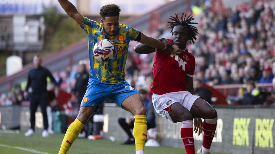 Tyreece Campbell battles for the ball
