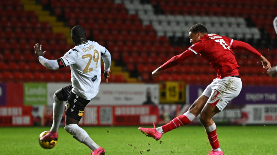 Miles Leaburn shoots at goal