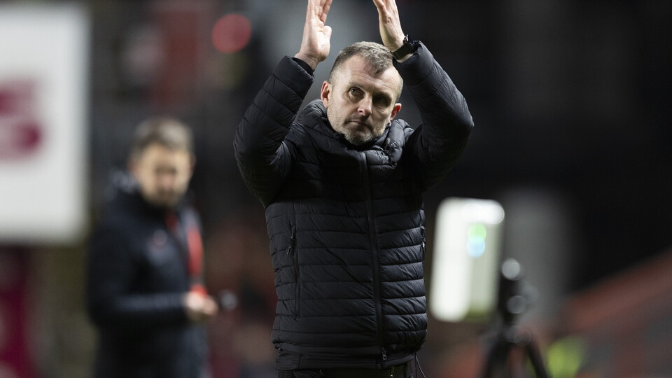 Nathan Jones claps supporters