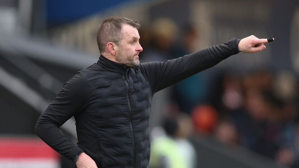 Nathan Jones watches on