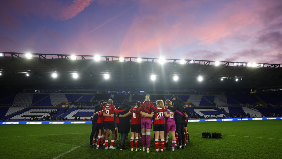 Group huddle at St Andrews