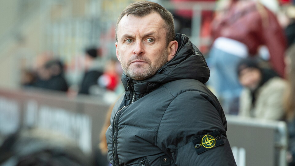 Nathan Jones looks on