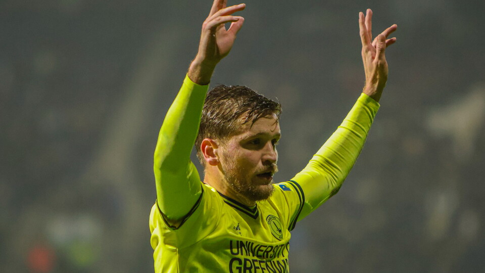 Luke Berry with his hands up