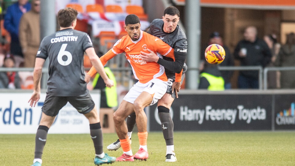 Lloyd Jones challenges for the ball
