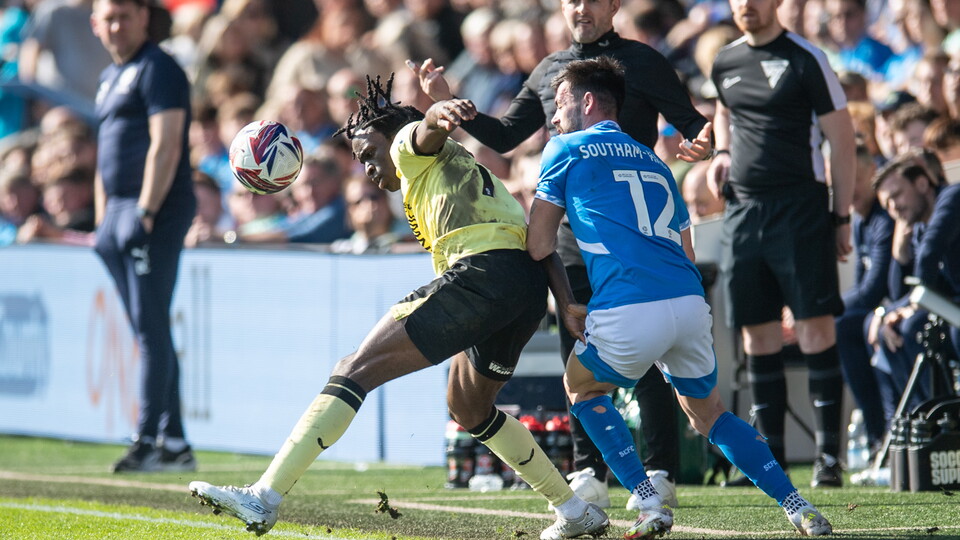 Charlton battle for the ball