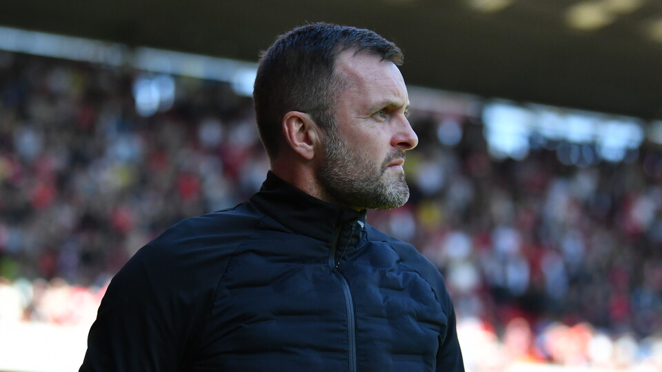 Nathan Jones watches on