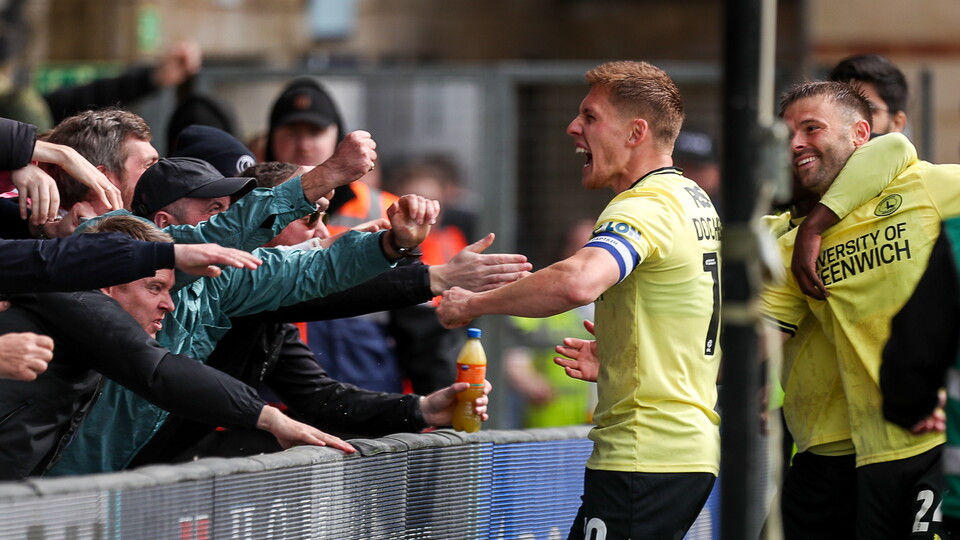 Greg Docherty celebrates with fans