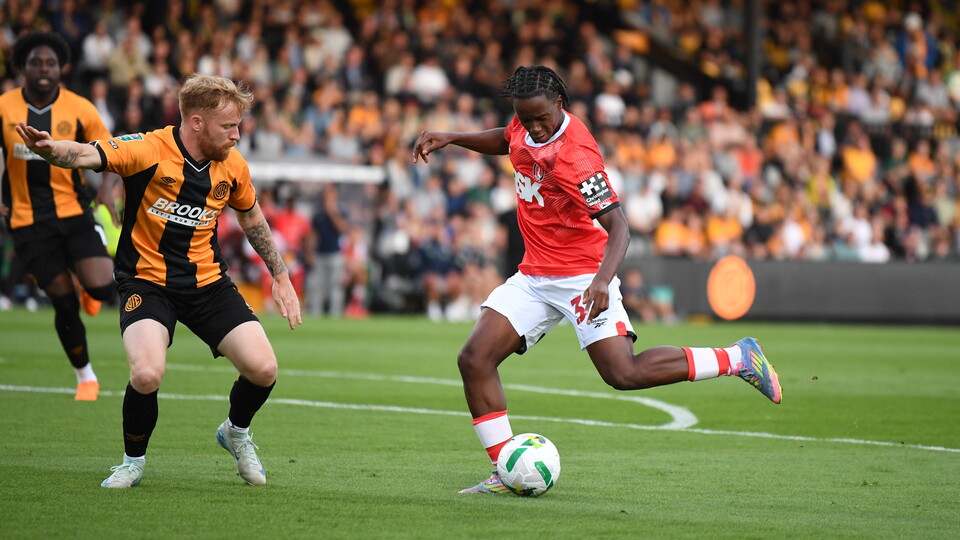 Charlton on the ball against Cambridge