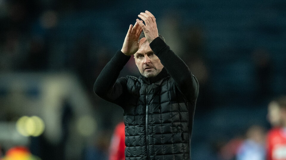 Nathan Jones claps supporters