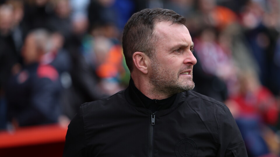 Nathan Jones looks on