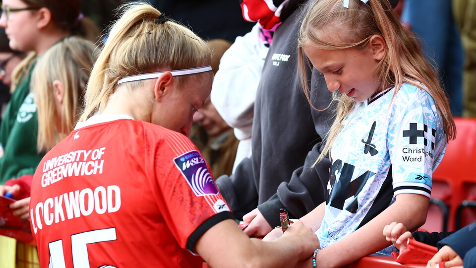 Katie Lockwood and a fan at Liverpool game