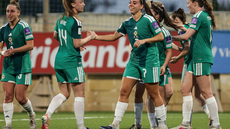 Ellie Mason celebrates with Northern Ireland team